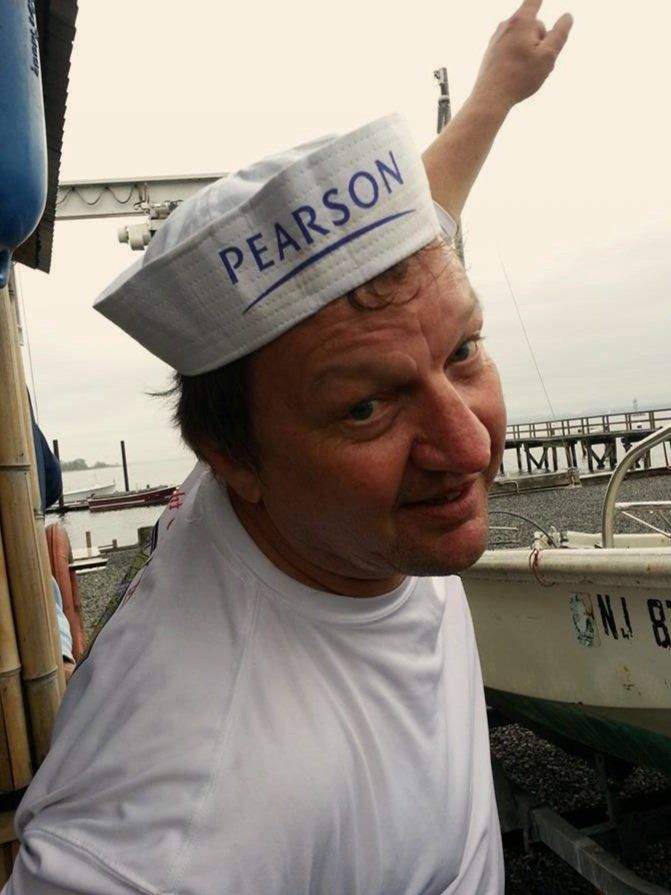 Captain Al wearing a Pearson sailing cap